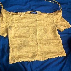 Yellow stretchy crop top.
